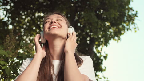 joyful woman listening to music