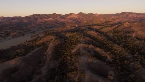 wide establishing shot of california mountains during sunset