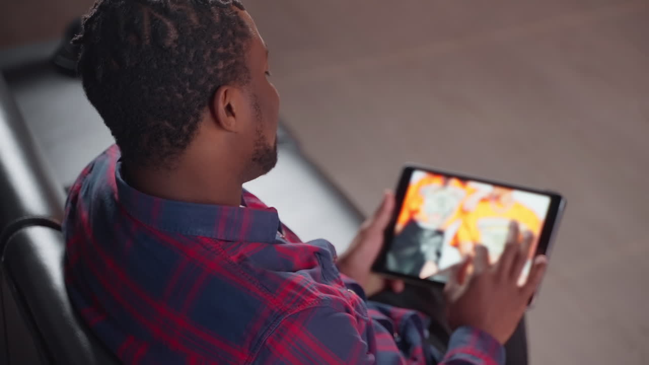Man using digital tablet
