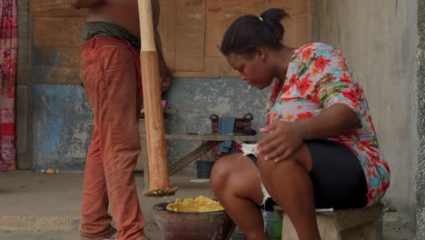 couple-of-black-africa-chef-preparing-fufu-a-pounded-traditional-meal-from-west-africa