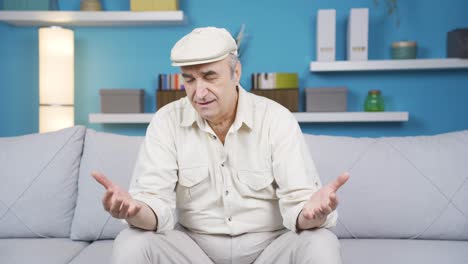 The-grieving-old-man-is-listening-to-a-rock-record-music-and-is-grieving.