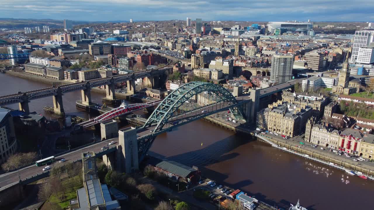 Drone over incredible Newcastle Upon Tyne, with Quayside bridges, city centre and St James' Park - England