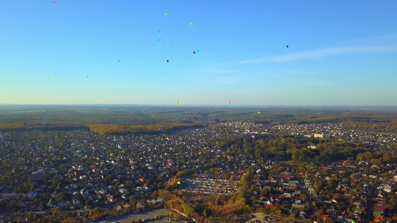 aerial view of colorful balloons over the city 02
