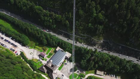 aerial view of people walking over highland 179 pedestrian suspension bridge near ehrenberg castle, reutte, germany