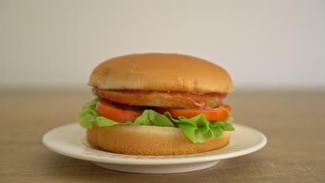 chicken burger with sauce on plate