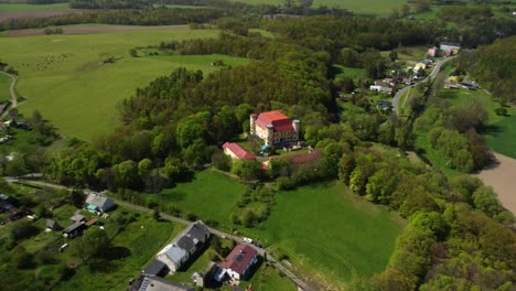 Aerial view of the female Castle. Czech castle on top of the hill. Divci Hrad, Czech Republic 4K