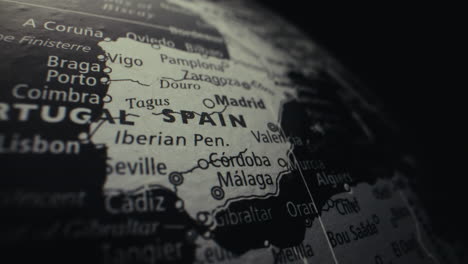 close-up of a globe map focusing on spain