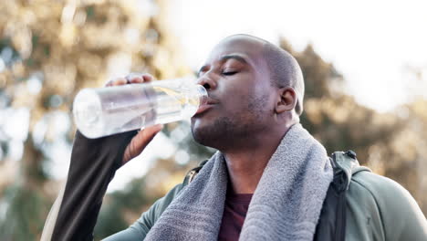 Outdoor,-exercise-and-black-man-drinking-water