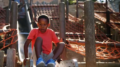 school kids playing on slide