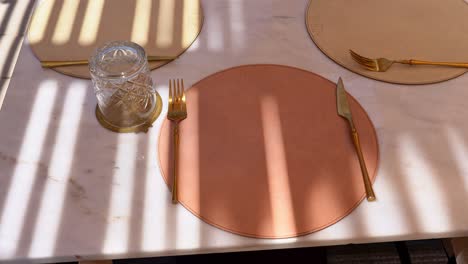 Front-view-of-stylish-and-light-dining-table-in-restaurant-close-up-shot,high-angle-shot