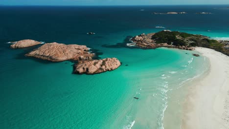 aerial-view-orbiting-around-twilight-beach-near-esperance-in-Western-australia