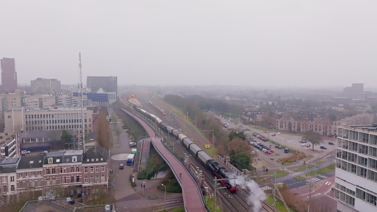 Drone Cinematic Follow of Steam Engine Entering Nijmegen