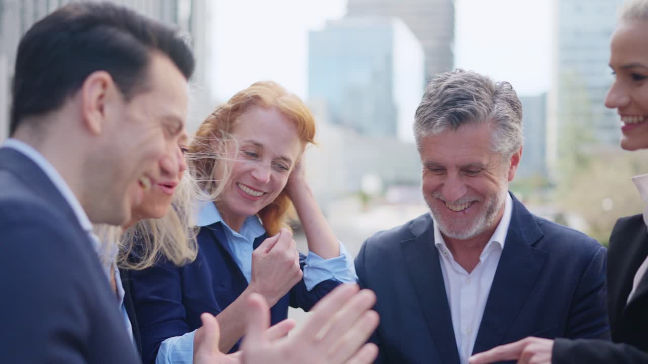 Happy Business Professionals Collaborating Outdoors