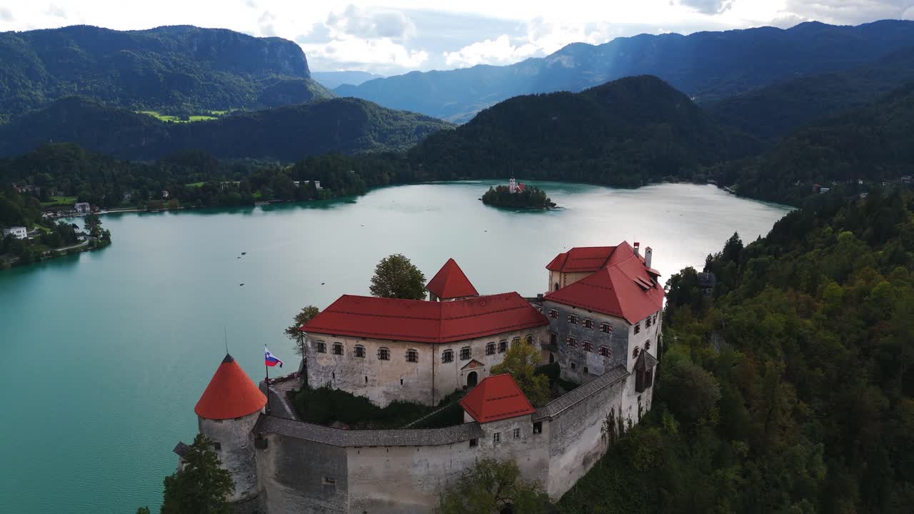 Bled Castle perched above tranquil Lake Bled in Slovenia, scenic and serene