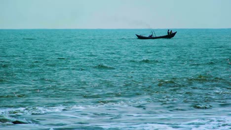 Fishermen-is-wooden-trawler-boat-sail-along-coast-in-Indian-ocean