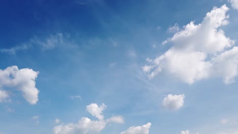 Time-Lapse-of-the-movement-of-clouds-on-a-clear-day-with-a-pan-scene
