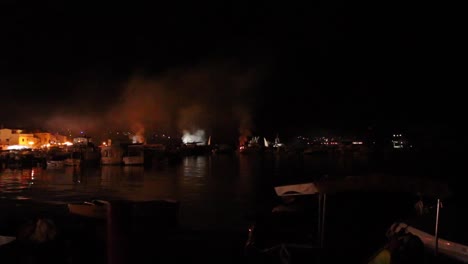 accident and fire burning up in the marine port from far away