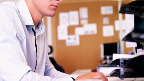 Executive-working-at-his-desk