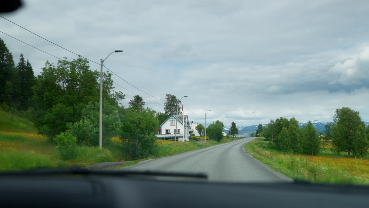 POV Of A Driver Inside A Car Driving Through The Road Along The Town In Northern, Norway