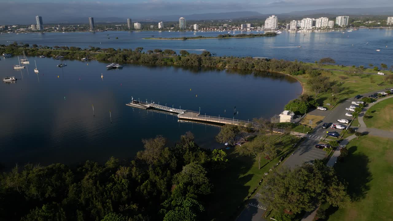 Left to right aerial view over Doug Jennings Park looking West over the Broadwater, Gold Coast, Australia.