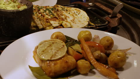 delicious chicken dish served with a colorful medley of fresh vegetables on a plate