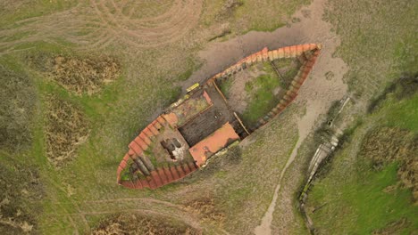 Top-down-spiral-ascent-view-of-rusting-shipwreck-at-Fleetwood-Marshes-Nature-Reserve