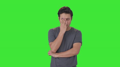 depressed indian man thinking about something green screen