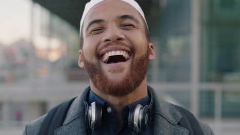 close up portrait of muslim businessman laughing young happy business owner