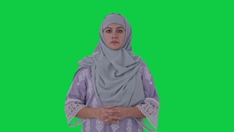 Serious-Muslim-woman-looking-at-the-camera-Green-screen