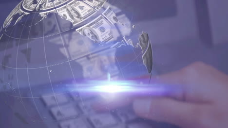 animation of moving light and rotating globe of dollar bills, over handoncomputerkeyboard