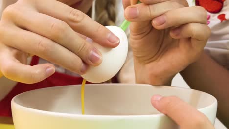 children dyeing easter eggs