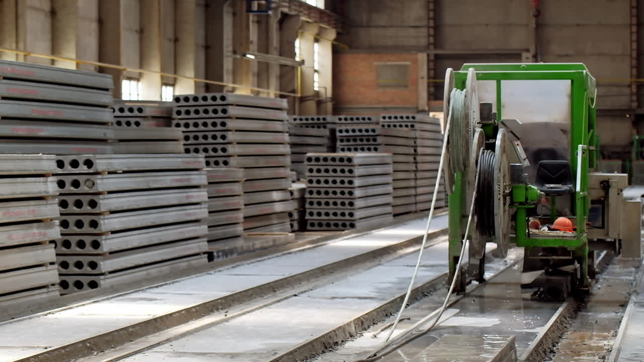 Concrete blocks in factory. Production process of concrete blocks