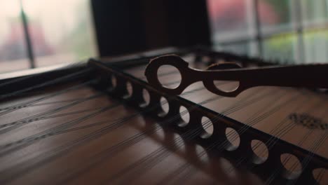 dulcimer-classic-traditional-old-wooden-instrument-string-hammering-close-up-slow-motion