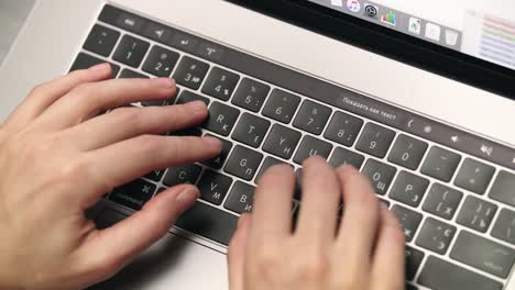 female hands typing text on laptop keyboard. woman hands working on laptop