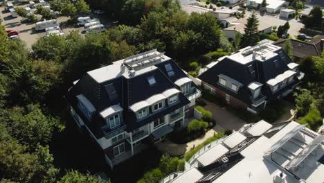 "Drone-footage-of-4-cozy-vacation-homes-surrounded-by-greenery-in-Northern-Germany