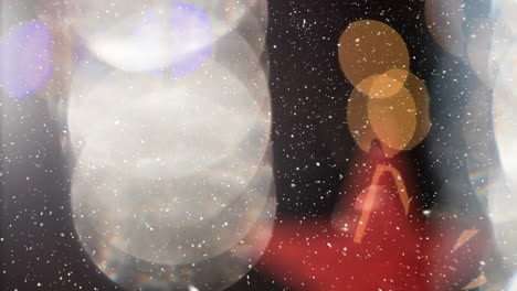 animación de la nieve cayendo sobre las luces de navidad bokeh