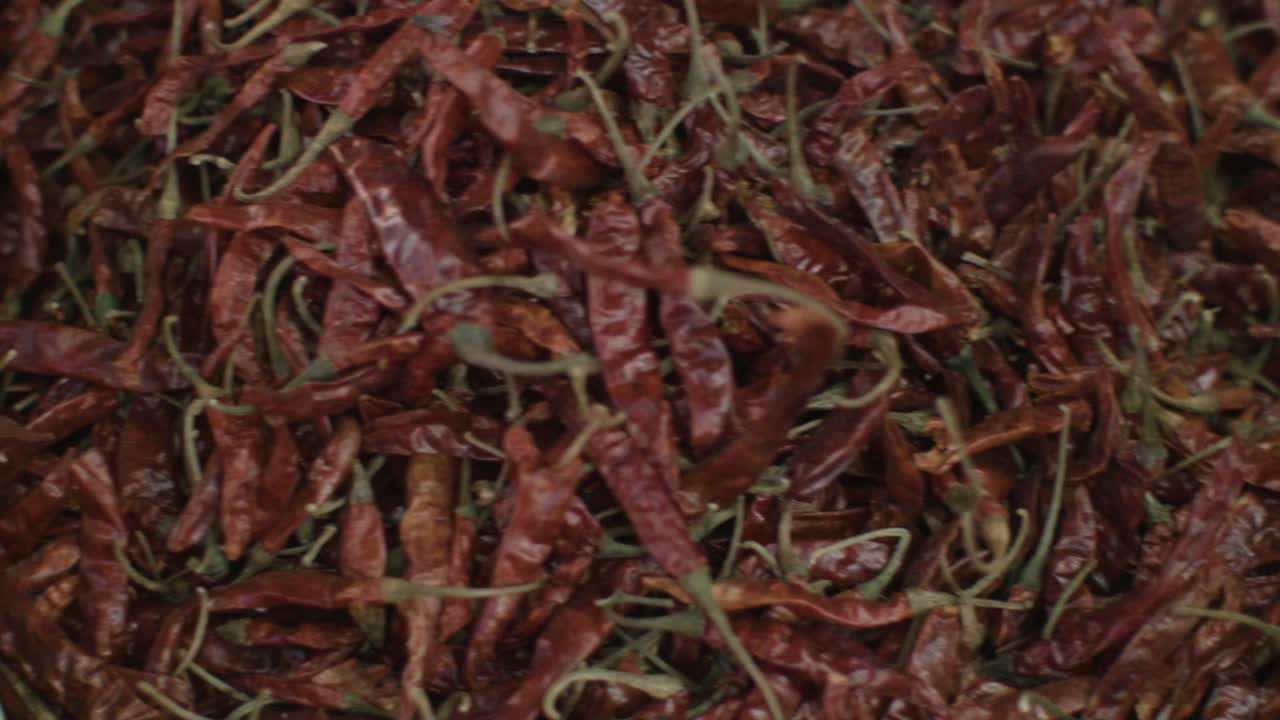 Red hot chili peppers in a jute bag on the market in India