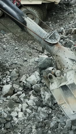 close-up of heavy machinery and rocks at an industrial site