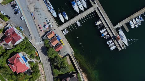 top down view of harbor in norra hamnen, lysekil, bohuslän, sweden - drone shot