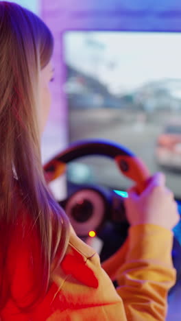 Girl playing car racing. Woman play the video game with virtual reality device
