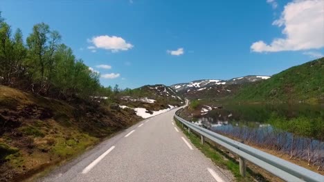 beautiful view on road in the norwegian mountains near the lake odda norway