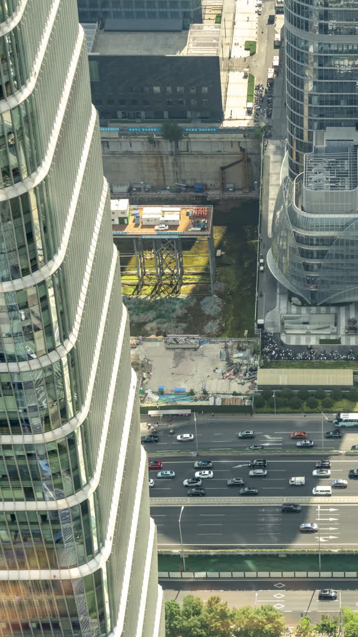 Timelapse of the Beijing city skyline from a high vantage point in vertical
