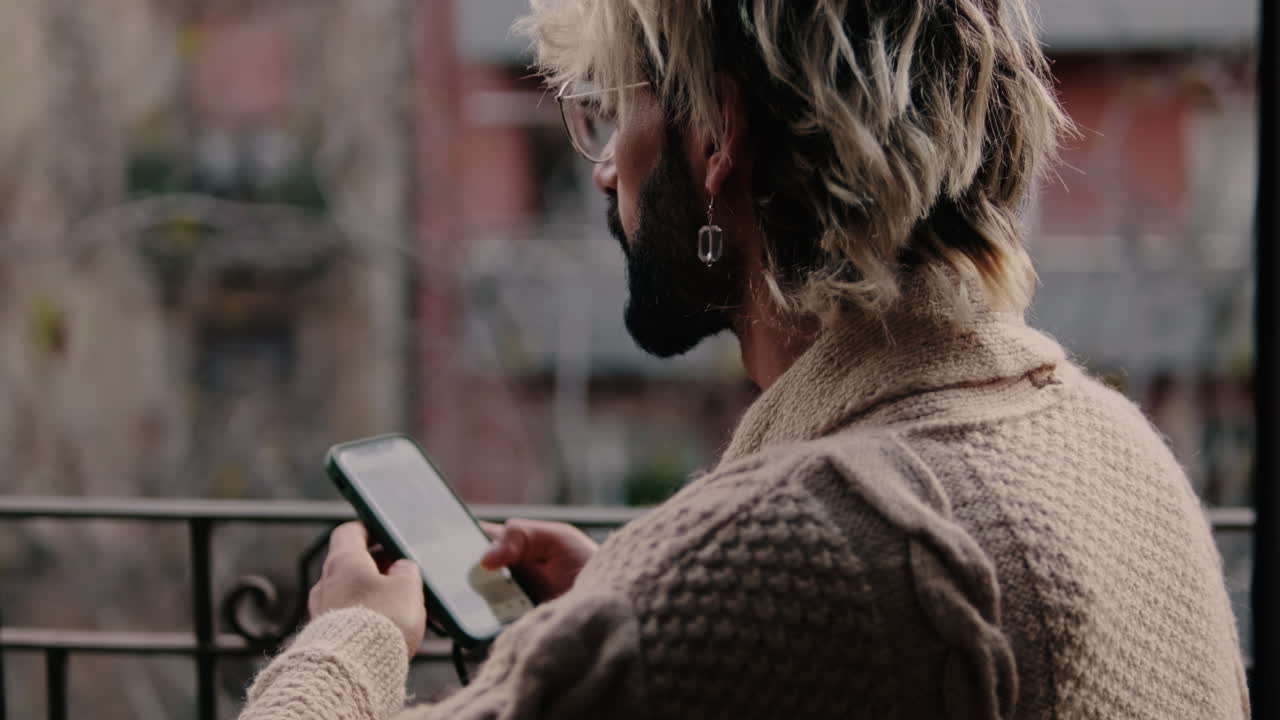 Gay Couple at Home: Relaxing on Balcony