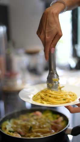 preparing pasta dish