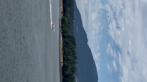 a seaplane taking off from vancouver harbour, british columbia canada - vertical orientation