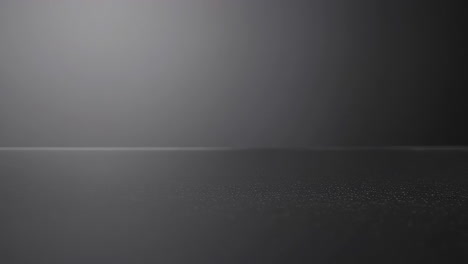 gray studio background with fog