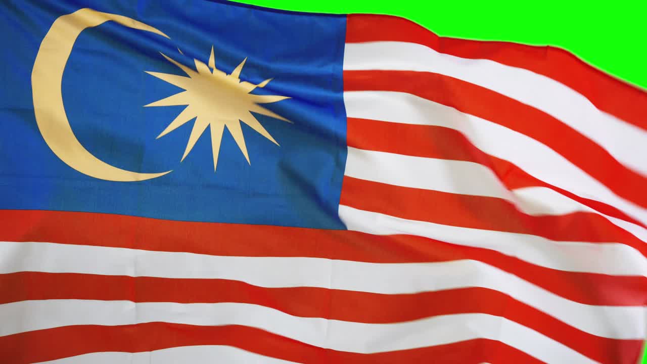 Primo piano della bandiera della Malesia che sventola in studio.