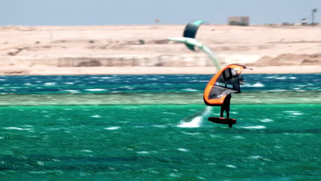 windsurfing in hurghada, egypt, 60 fps people enjoy recreational water sea sport in touristic destination