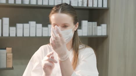 cosmetologist preparing syringe for procedure