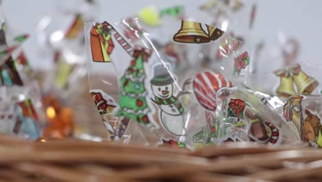 slow rotating shot of small sweet gift bags in a basket to take